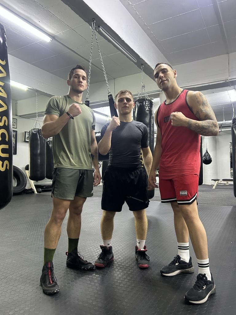 Doron with clients at the gym