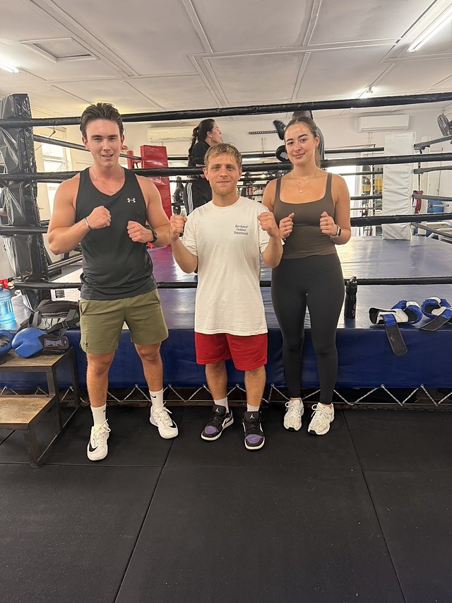 Doron with two clients after a private group boxing session in the ring